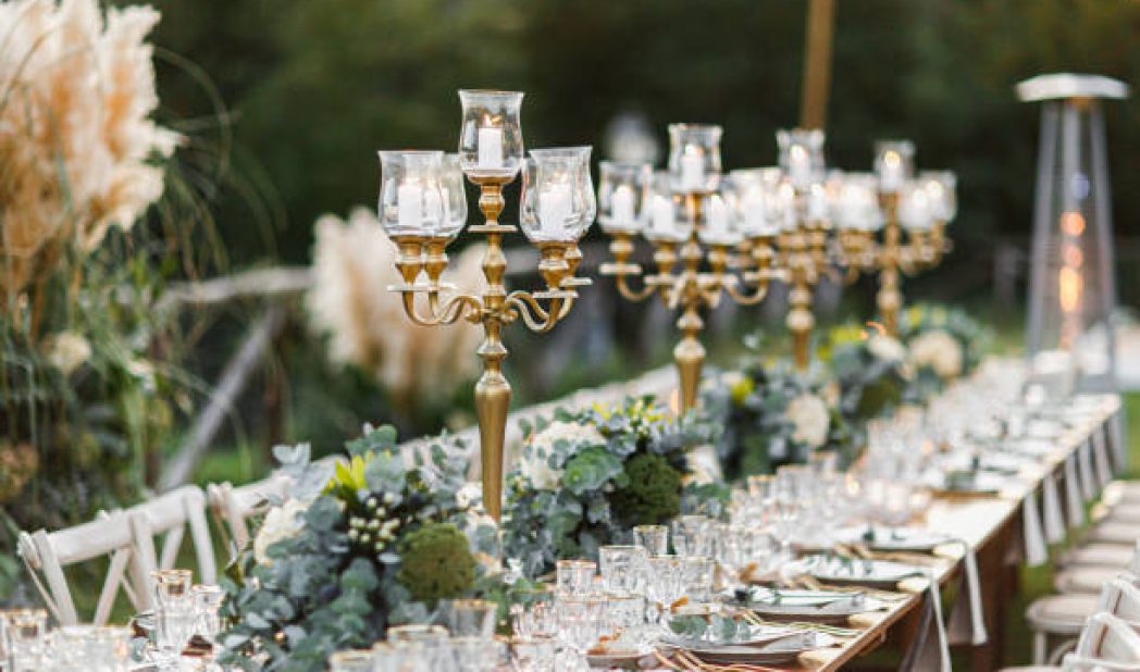 Wedding table set up in boho style with pampas grass and greenery, soft focus Wedding table set up in boho style with pampas grass and greenery, soft focus
