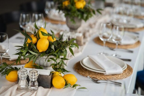 festive-table-wedding-party-decorated-with-lemon-arrangements_688382-2691